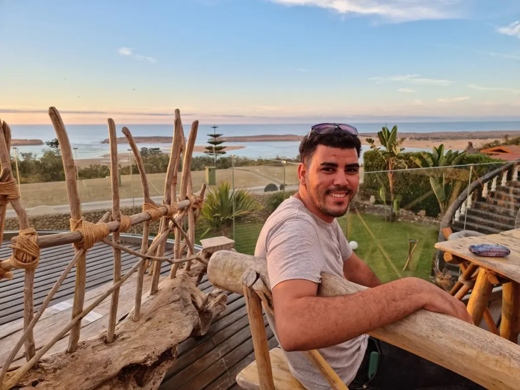 Aziz Azoulay from Desert Trips Morocco enjoying a coastal view during a Morocco tour