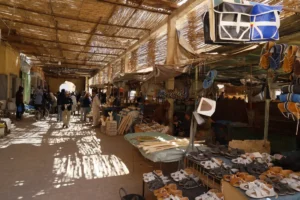 Traditional souk in Rissani with local shops during a Morocco desert tour